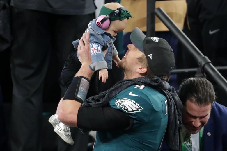 MINNEAPOLIS, MN - FEBRUARY 04: Nick Foles #9 of the Philadelphia Eagles celebrates with his daughter Lily Foles after his 41-33 victory over the New England Patriots in Super Bowl LII at U.S. Bank Stadium on February 4, 2018 in Minneapolis, Minnesota. The Philadelphia Eagles defeated the New England Patriots 41-33. (Photo by Streeter Lecka/Getty Images)